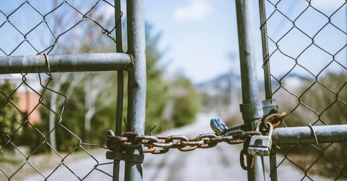 gate secured with a lock and chain